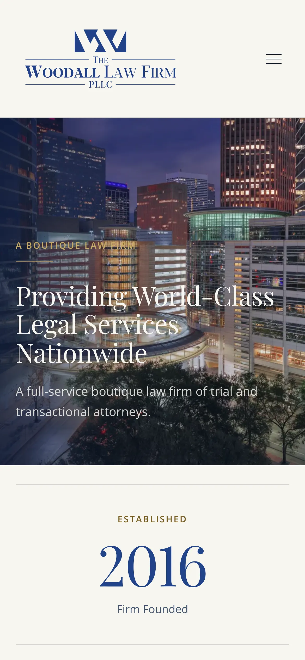 woodalllawfirm.com homepage at rest, on a phone.